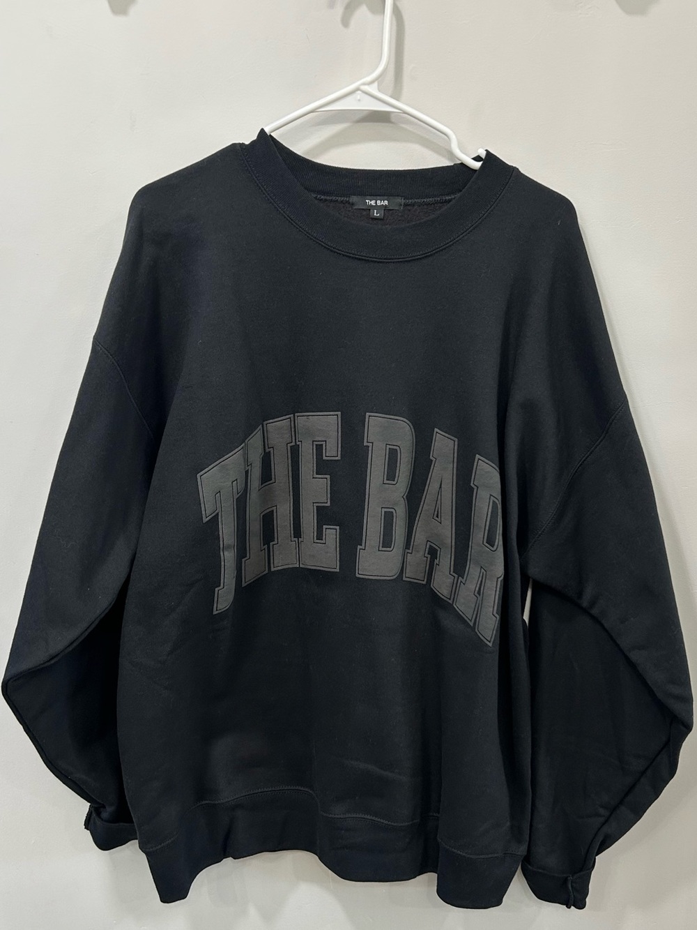 NEW w/out tags- The Bar Black Varsity Sweatshirt size large